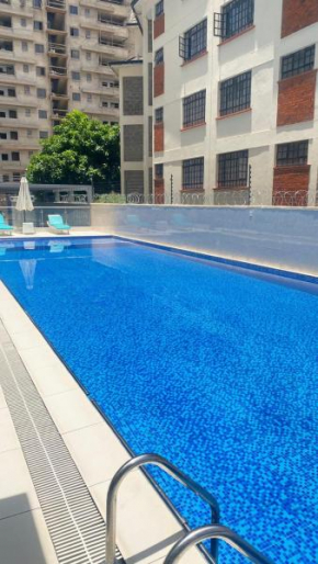 The executive cozy corner apartments with breathtaking city views ,rooftop chill spot area,heated swimming pool ,gym and modern lifestyle amenities